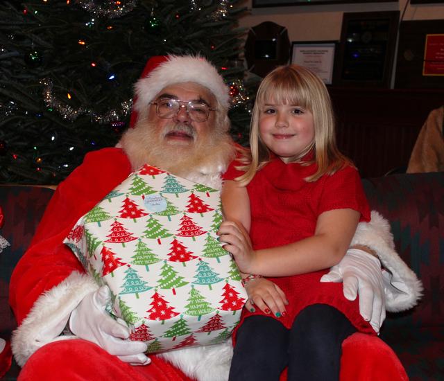 Children's Christmas Party at 8-100. 12-9-2012. Santa pays a visit . Photo by Vincent P. Tuzzolino